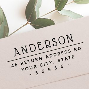 Self-inking return address stamp with elegant family name