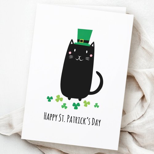 Happy St. Patrick's day card with black cat