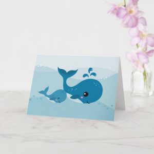 Cute whales swimming in the sea any occasion card