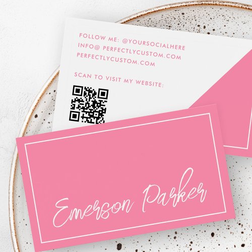 Trendy modern business card with a pink and white color scheme, cursive script, diagonal accent, QR code, and customizable text, perfect for networking and professional branding.