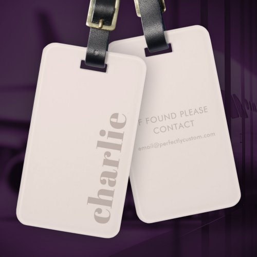 Modern minimal luggage tag with custom name on muted pink background and customizable text on back