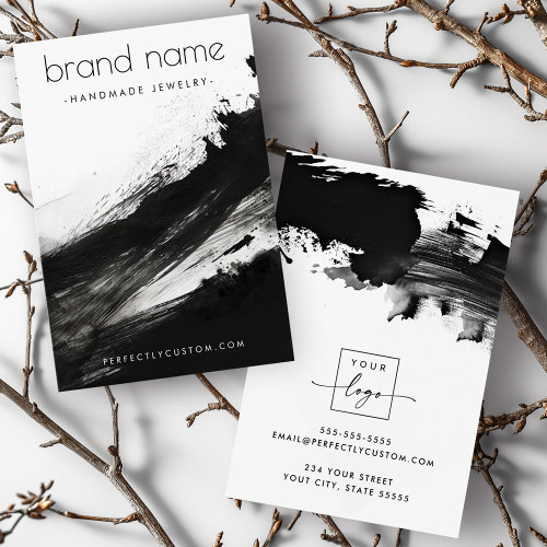 Custom black-and-white earring display card with abstract brushstroke art and customizable branding.