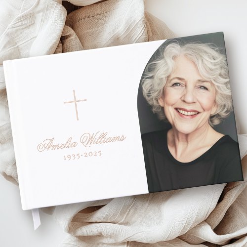 White memorial guest book with foil cross, custom name, dates, and portrait on the front cover. Includes foil personalization on the spine and available in gold, silver, or rose gold foil. A modern and elegant keepsake for funerals and celebrations of life.