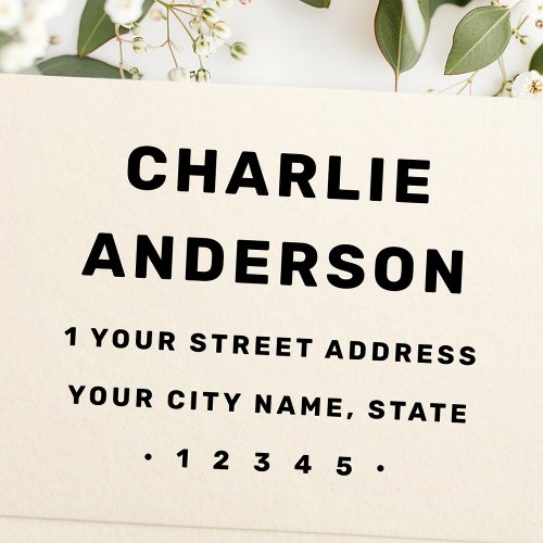 Personalized bold modern return address rubber stamp with custom name and address.