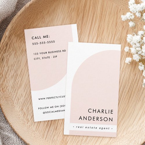 Blush pink and white business card with modern arch design and Scandinavian minimalist style.